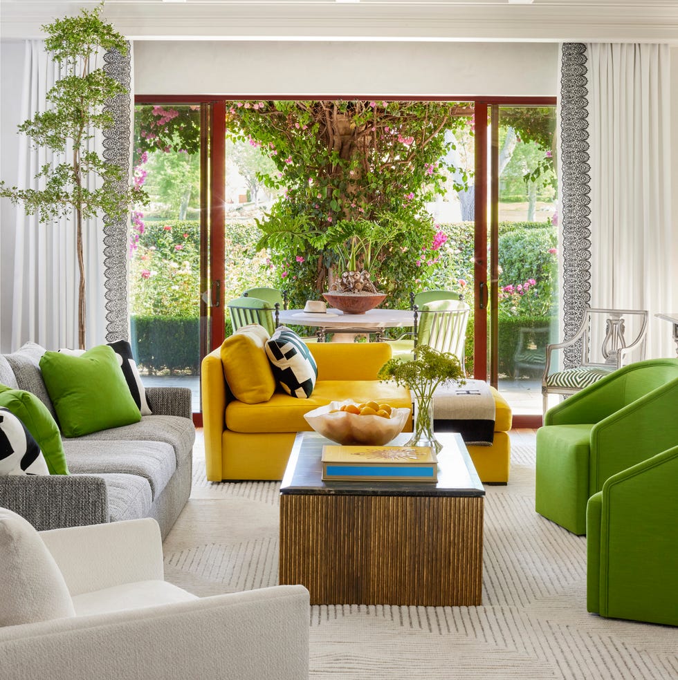 Spacious room with windows and lighting
